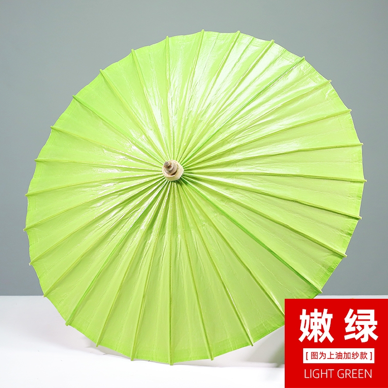 嫩绿色油纸伞
